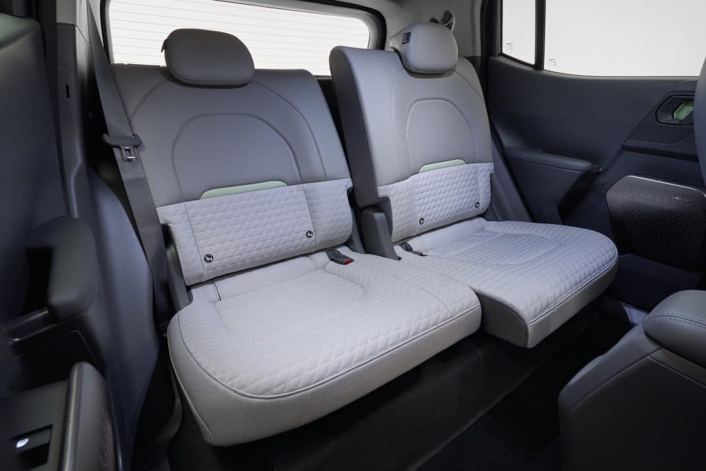 Baksätet med flexibel sätesrad i Kia EV2.